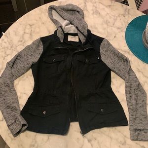 Black and gray hooded zip up jacket in size small